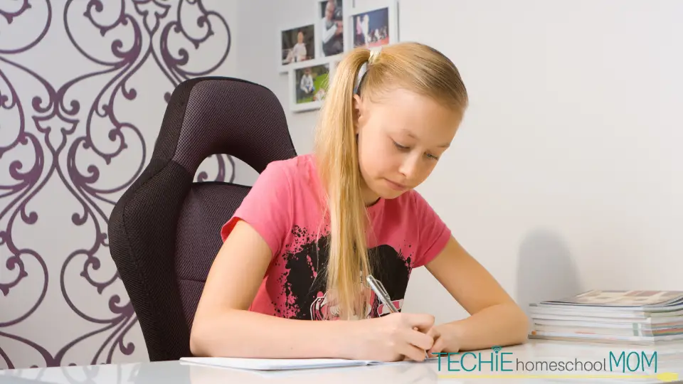 A girl doing math homework.